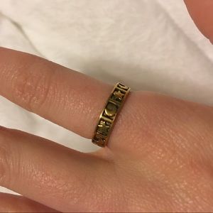 Adjustable gold star and moon ring